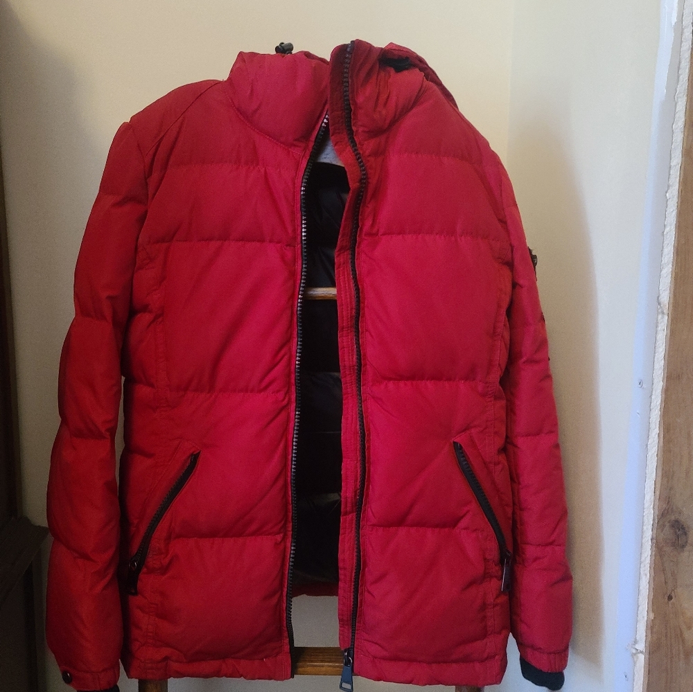 Calvin Klein puffer jacket with padded hood.